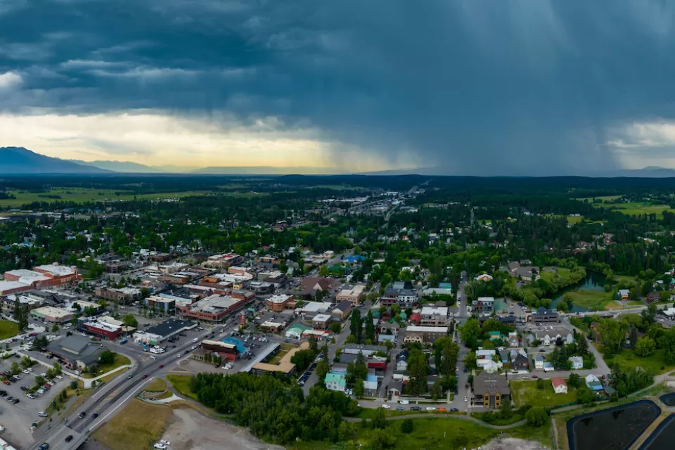 Aerial view of Whitefish, Montana with storm clouds in background